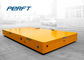 motorized plate transfer cars on cement floor used in industrial and workshop