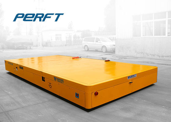 industrial using electric trackless transfer cart to transport heavy material