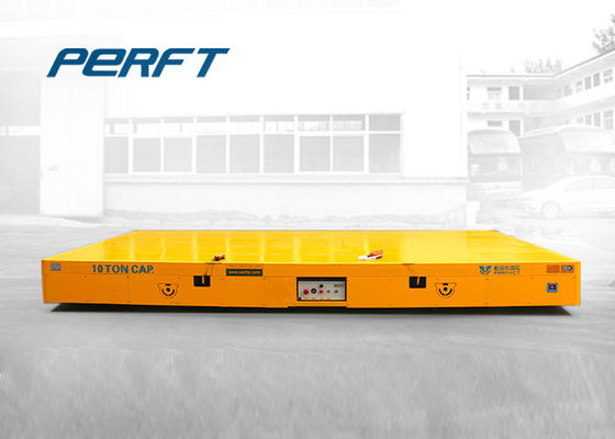 industrial using electric trackless transfer cart to transport heavy material